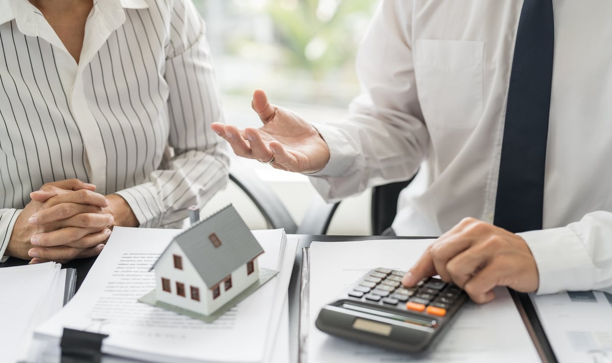 Business people signing a property management agreement